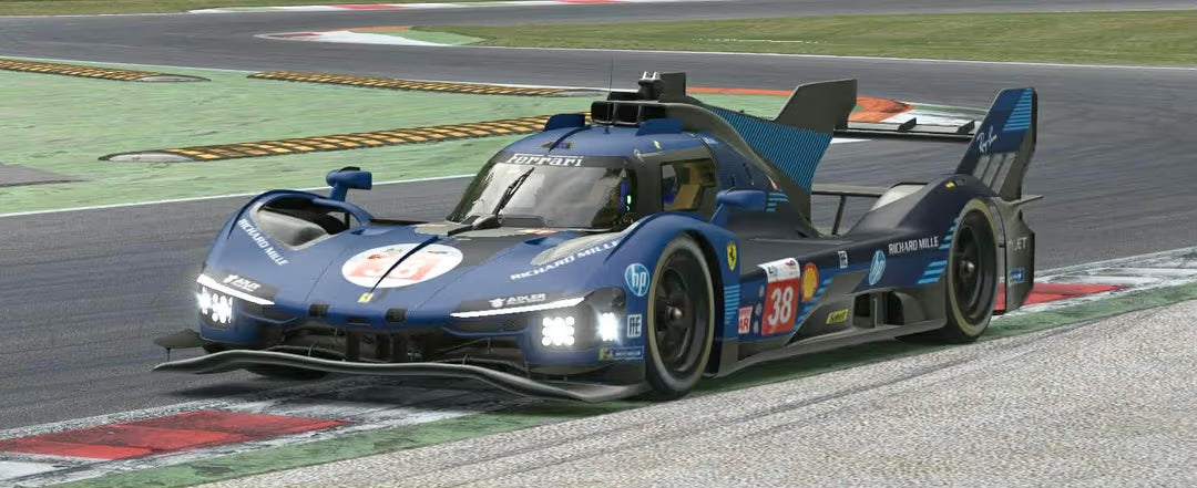 Blue prototype race car, number 38, on a racetrack.