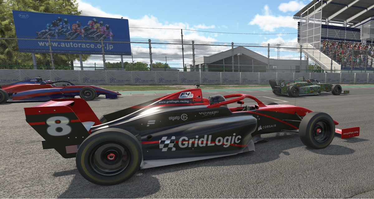 Grid Logic open-wheel car number 8 on track with other formula cars.